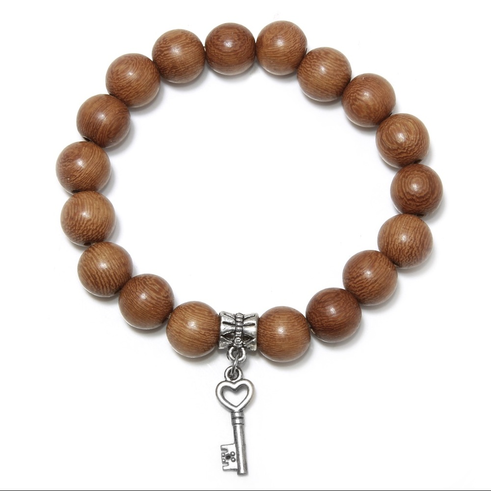 Wood bead bracelet with silver key charm